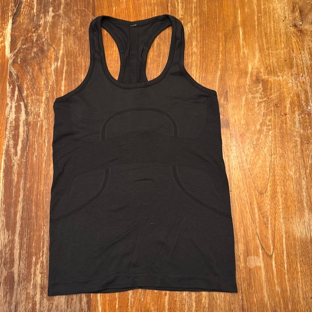 Swiftly Tech Racerback Tank Top
Hip Length, size 8